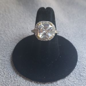 Crystal gold bevel ring with surrounding pave